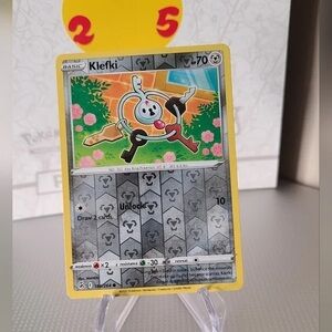 Klefki Trading Card with Red and Green Highlights